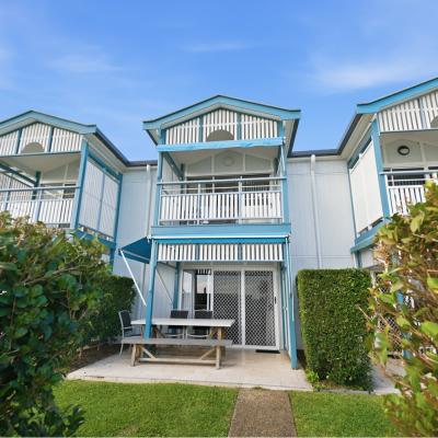 villa 3 beachfront tangalooma moreton island exterior blue skies